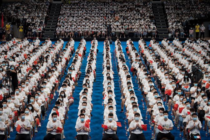 Students at the Huazhong University of Science and Technology attend a commencement ceremony in Wuhan, China, on September 4. Wuhan is where the coronavirus outbreak was first reported.