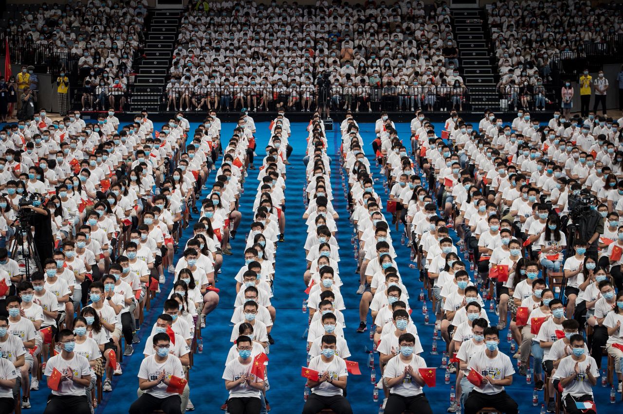 Students at the Huazhong University of Science and Technology attend a commencement ceremony in Wuhan, China, on September 4. Wuhan is where the coronavirus outbreak was first reported.