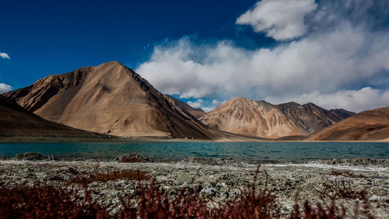 Mountains rise over the Pangong Tso Lake on October 5, 2012 near Leh in Ladakh, India. 