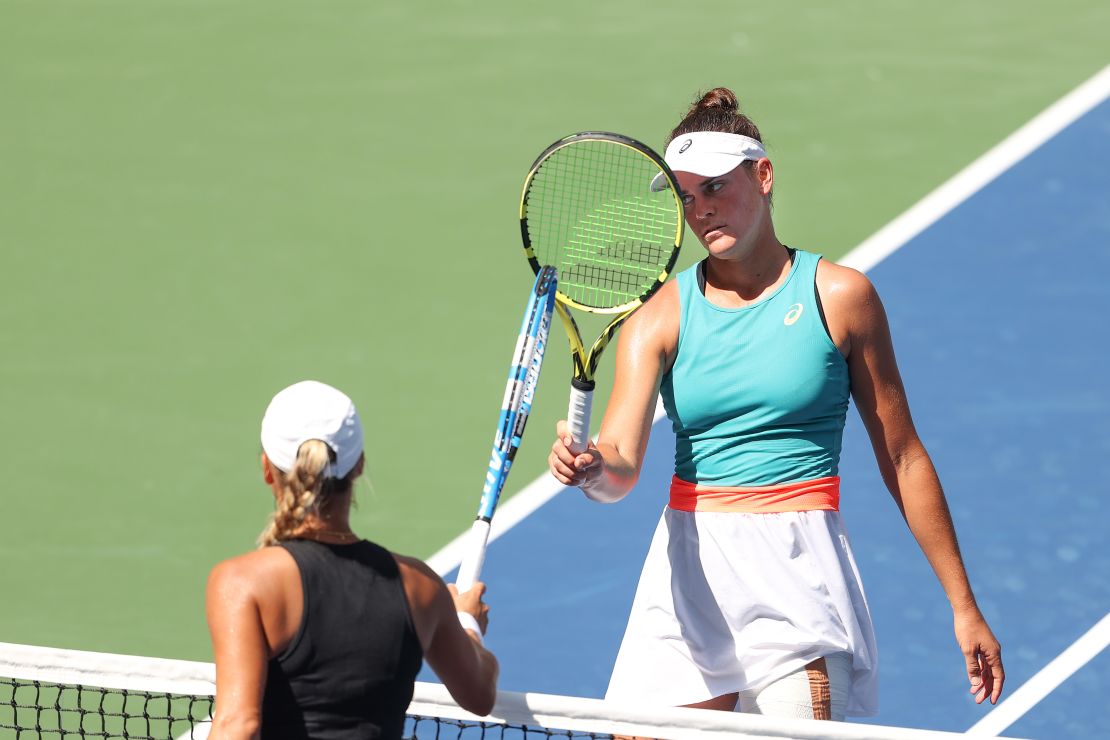 Jennifer Brady taps rackets with Yulia Putintseva after their match at the US Open ended Tuesday. 