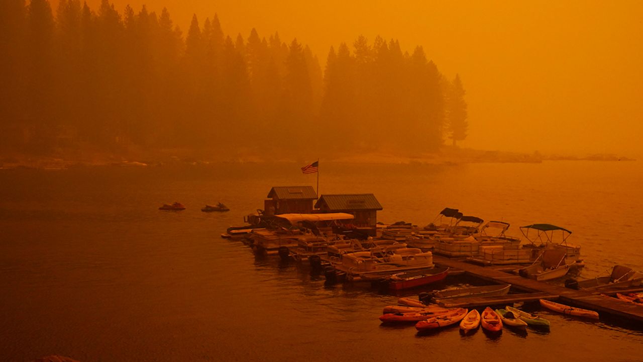 Smoke from the Creek Fire fills the air over a boating dock, Sunday, Sept. 6, 2020, in Shaver Lake, Calif.