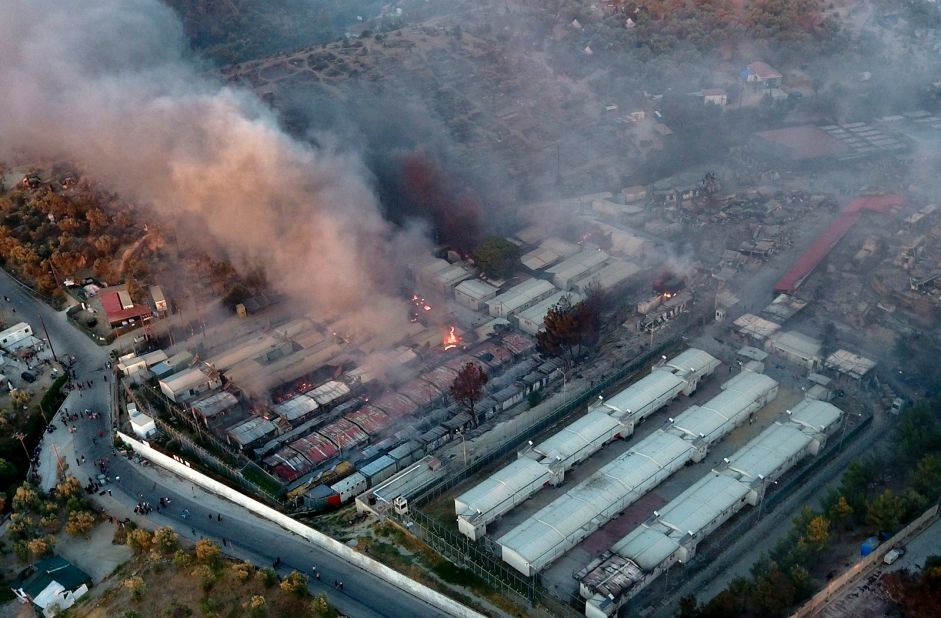 This aerial photo shows burning container houses and tents.