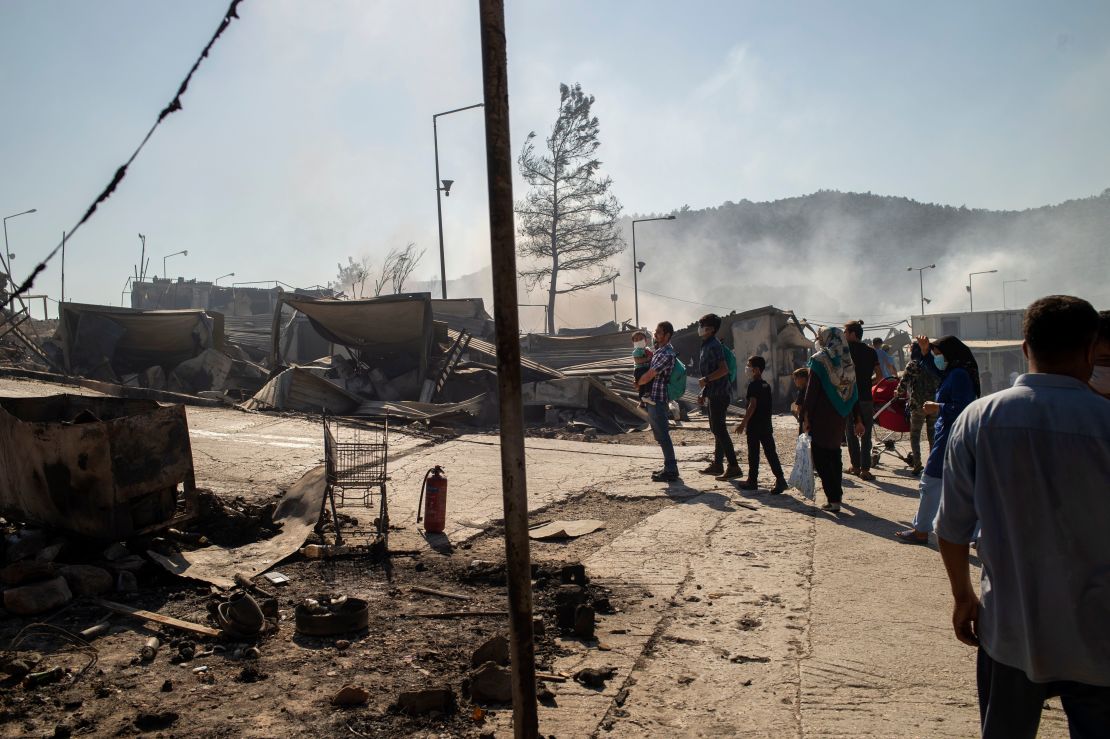 Smoke rises at the burnt camp of Moria on the island of Lesbos on Wednesday the morning after a major fire broke out.