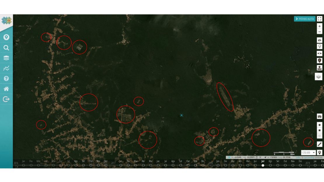 Satellite view of forests in southern Amazonas state in July 2020, showing cleared tracts annotated in red by MapBiomas.