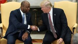 WASHINGTON, DC - FEBRUARY 14:  U.S. President Donald Trump shakes hands with Sen. Tim Scott (R-SC) during a working session regarding the Opportunity Zones provided by tax reform in the Oval Office of the White House February 14, 2018 in Washington, DC. President Trump hosted a group of local elected officials, entrepreneurs, and investors to discuss "how the 'Opportunity Zones' designation in the Tax Cuts and Jobs Act will spur investment and job growth in distressed communities."  (Photo by Alex Wong/Getty Images)
