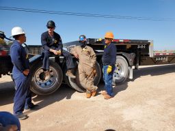 Bobby Bounds' team of industrial painters. Bounds lost half a million dollars in active business when stock markets crashed in March.