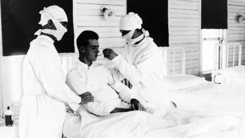As people living during the 1918 influenza pandemic approached Halloween, they had to balance a desire for fun with the risk of catching and spreading a deadly disease. 
