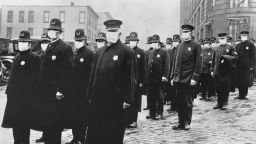 Spanish Flu Epidemic 1918-1919 in America. Policemen in Seattle, Washington, wearing some of the 1700 masks provided by the Red Cross to prevent the spread of influenza. Dec. 1918