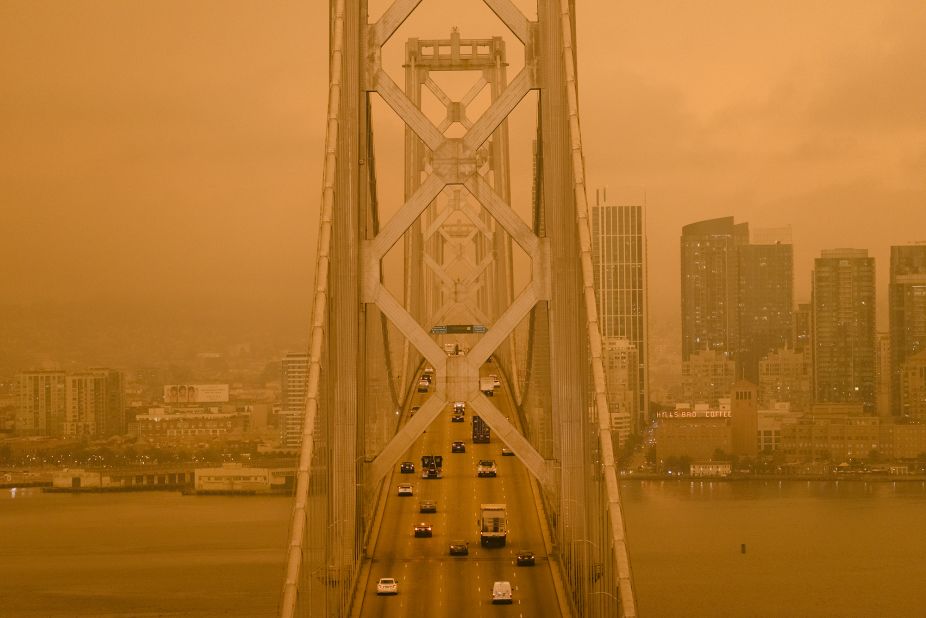 Wildfire smoke hangs over the San Francisco-Oakland Bay Bridge on September 9, 2020.