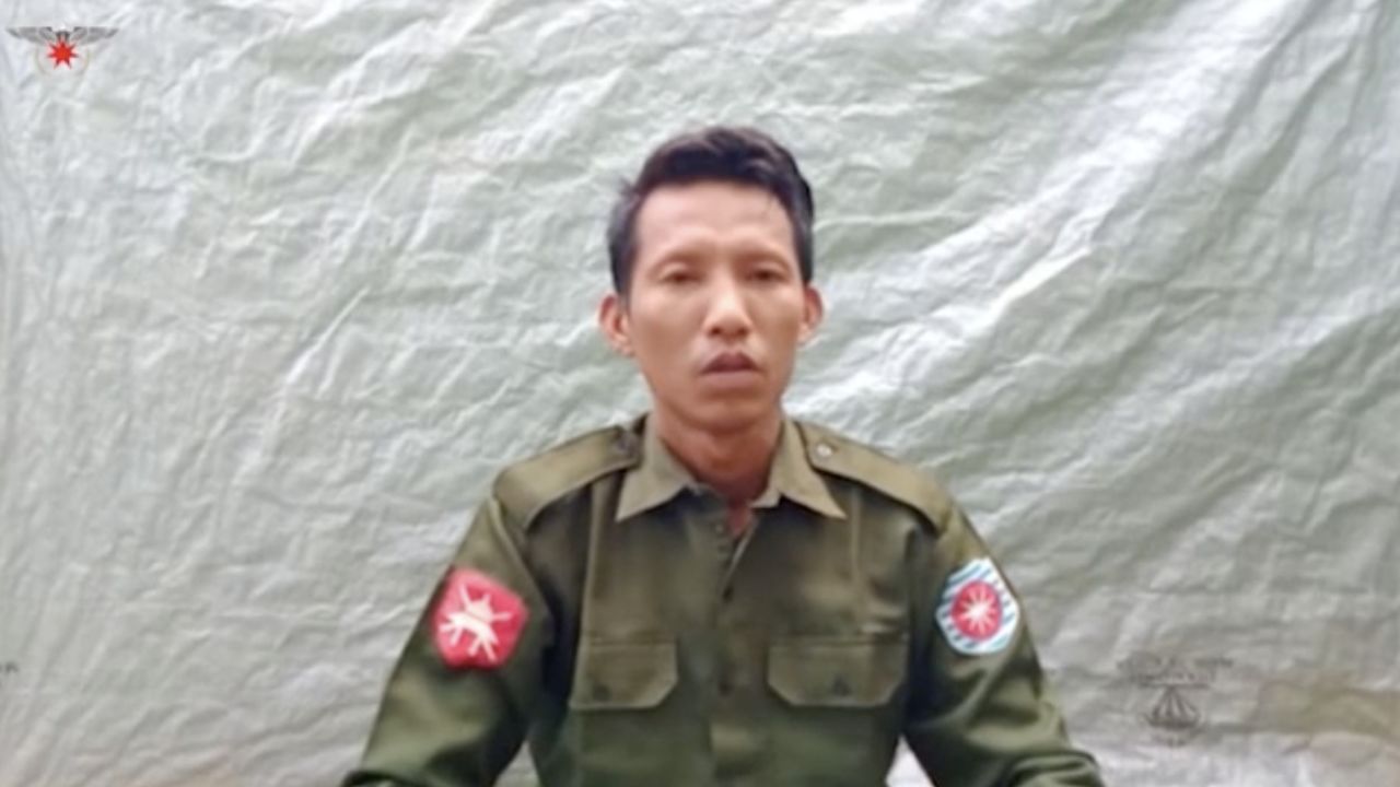 A still image of a video filmed by the Arakan Army in July in which Myanmar Private Myo Win Tun confesses to participating in the mass killing of Rohingya Muslims in 2017.