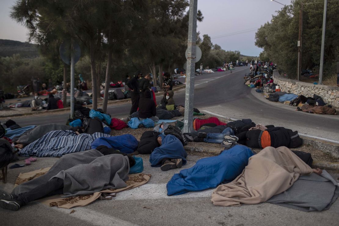 A group of 406 unaccompanied minors have been removed from the island. The camp was home to an estimated 13,000 people, more than six times its maximum capacity.