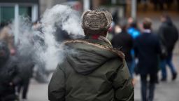 A person exhales vapor while using an electronic cigarette device in New York, U.S., on Wednesday, Jan. 8, 2020. The U.S. Food and Drug Administration said it would ban fruit and mint flavors that have been blamed for getting millions of children hooked on e-cigarettes, a months-in-the-making plan designed to curb an epidemic of underage vaping. Photographer: Michael Nagle/Bloomberg via Getty Images