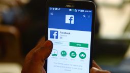 This photo illustration taken on March 22, 2018 shows apps for Facebook and other social networks on a smartphone in Chennai, India