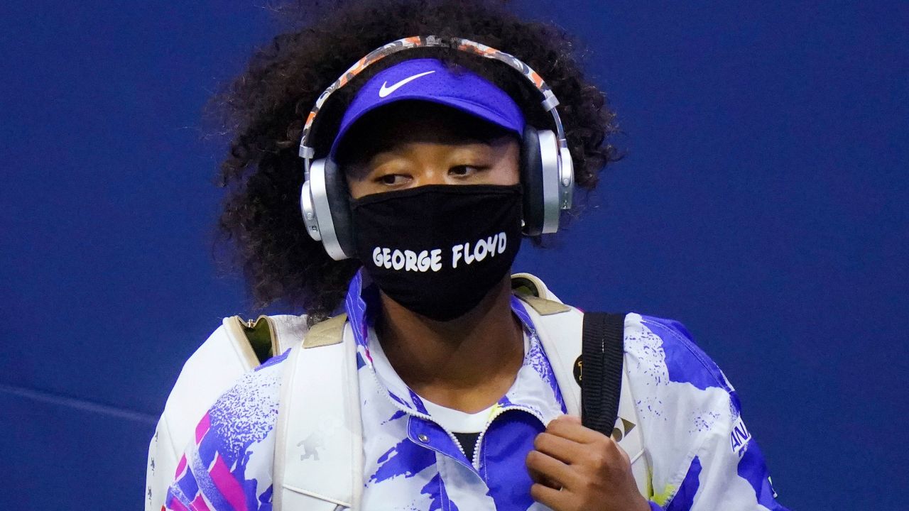Osaka wears a face mask bearing Floyd's name before her match against Shelby Rogers.