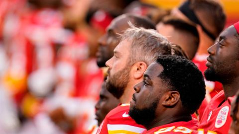 Kansas City Chiefs players stand for a presentation on social justice before an NFL football game against the Houston Texans Thursday, Sept. 10, 2020, in Kansas City, Mo. 