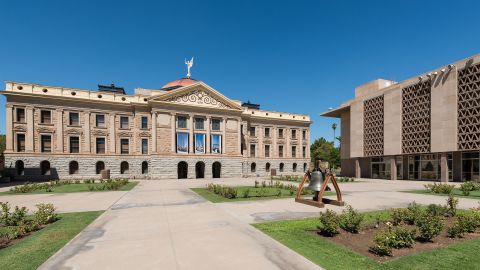 Arizona, whose State Capitol building and House of Representatives are pictured here, uses census population data to distribute state tax revenues.