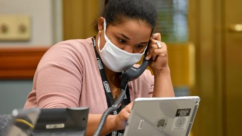 Census worker Anna Arroyo takes calls about the census at City Hall in Reading, Pennsylvania, on September 1.