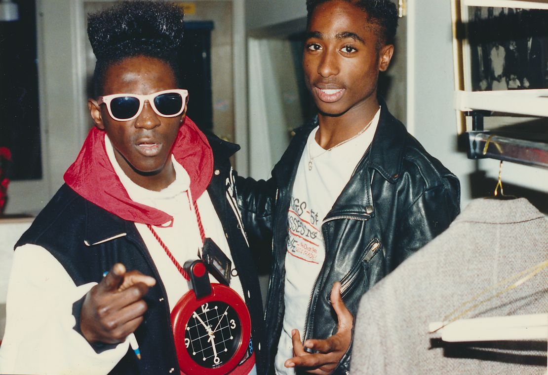 Public Enemy's Flavor Flav with  Tupac Shakur backstage during the 1989 American Music Awards in LA