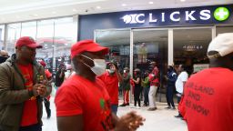 MIDRAND, SOUTH AFRICA - SEPTEMBER 07: A general view of EFF supporters protesting at Mall of Africa during the national shutdown of all Clicks outlets on September 07, 2020 in Midrand, South Africa. This comes after the offensive and racist advert by Clicks that undermined the dignity of black people and suggested that the hair of black people is damaged and inferior to that of white people. (Photo by Luba Lesolle/Gallo Images via Getty Images)