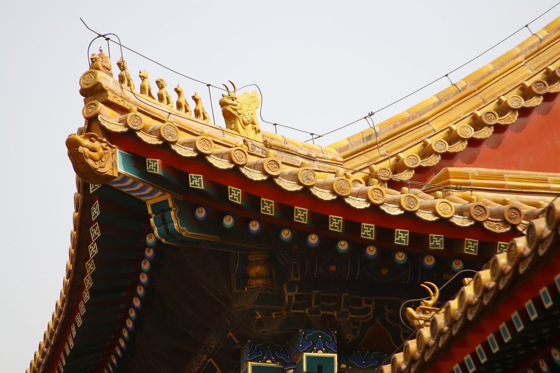 Decorative elements on the roof of a building in the Forbidden City.