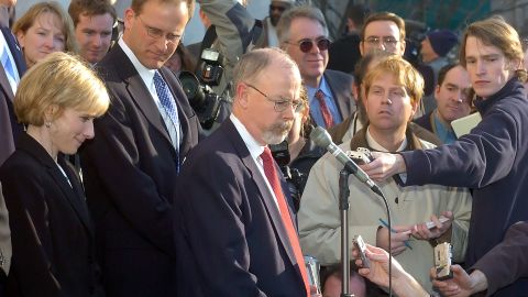 Deputy U.S. Attorney John Durham speaks to reporters outside U.S. District Court in New Haven, Conn., Friday, March 18, 2005. At left is Assistant U.S. Attorney Nora Dannehy.