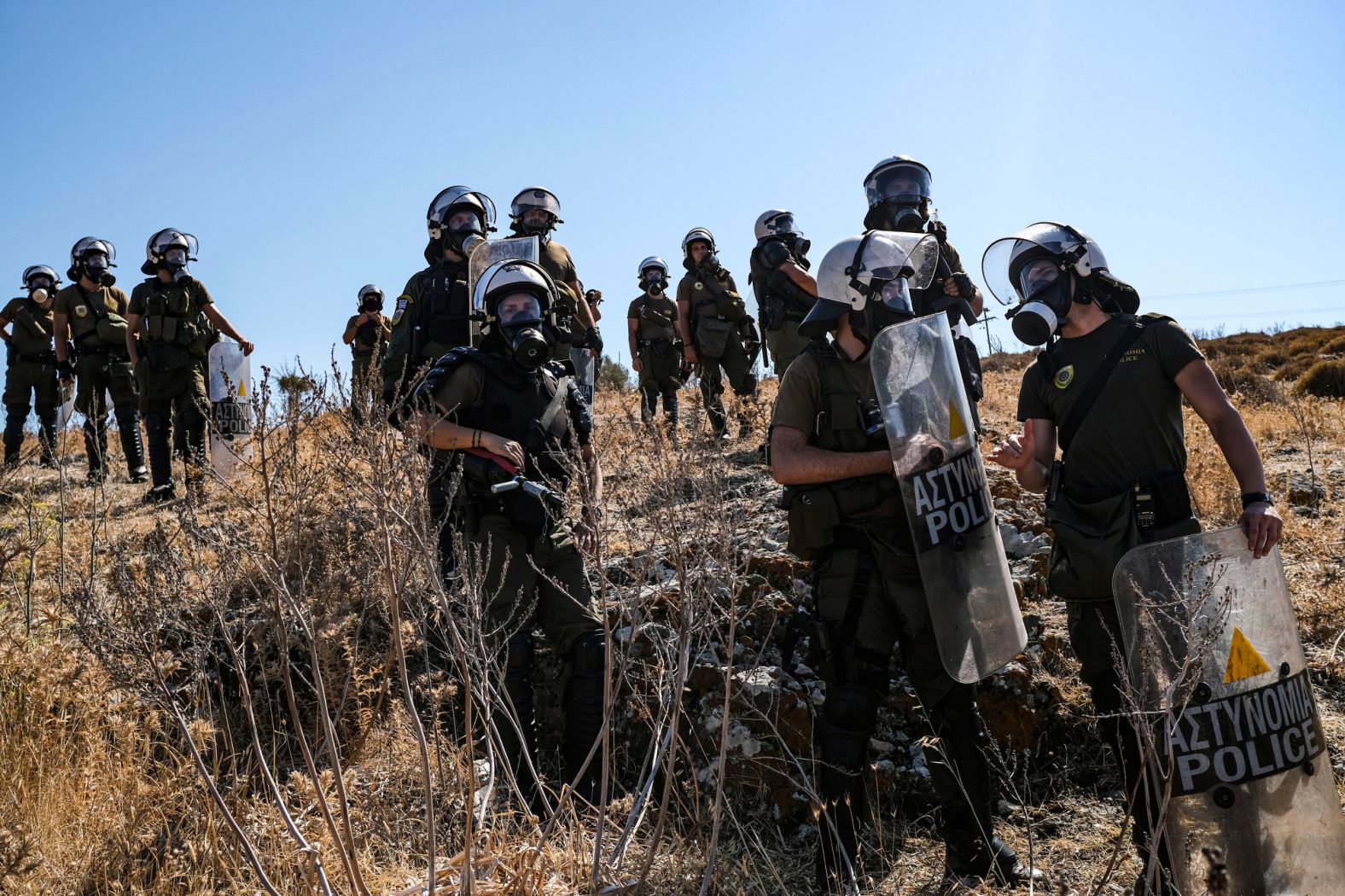 Greek police keep tabs on migrant protests on September 11.