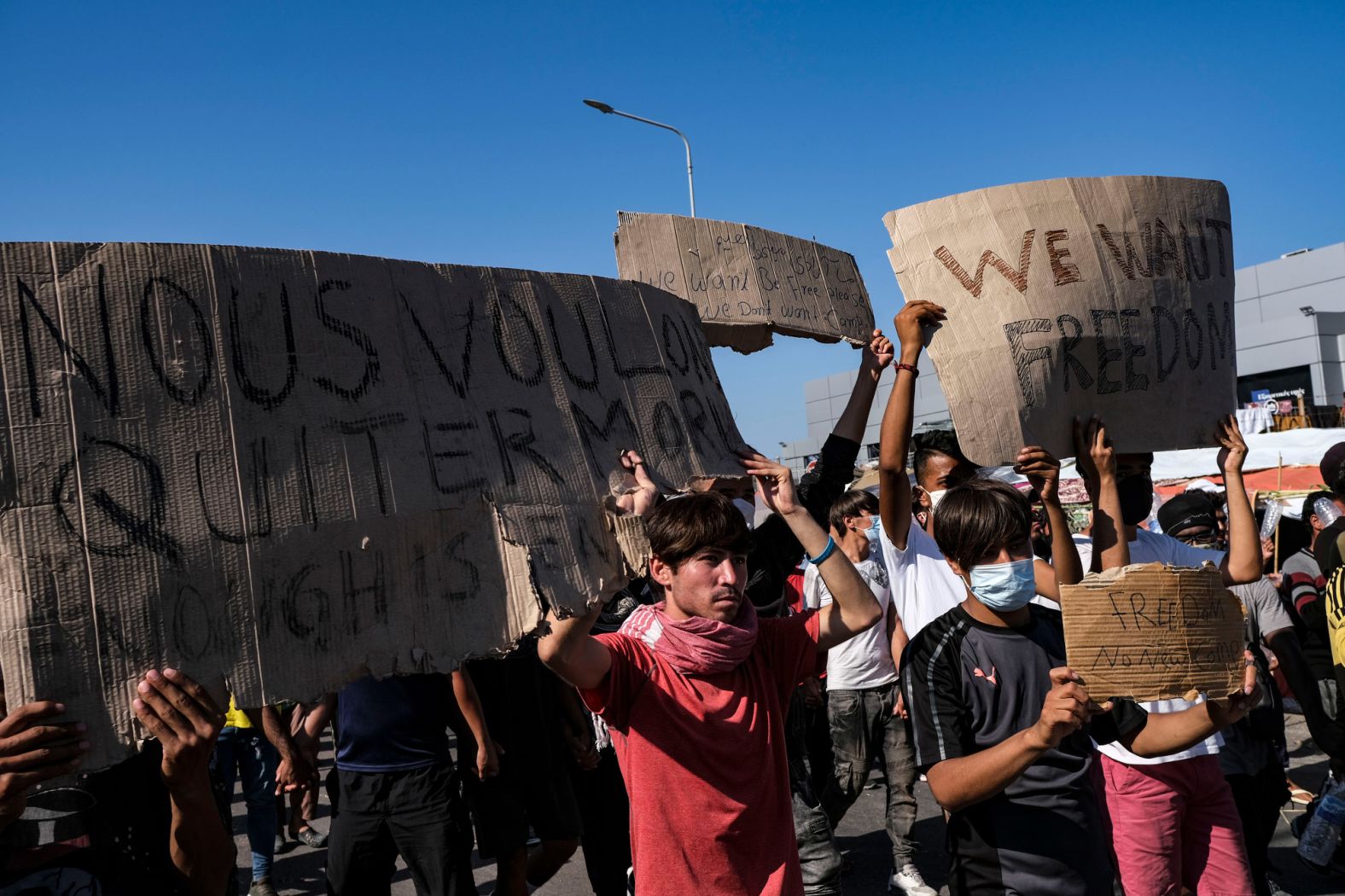 Displaced migrants protest on September 11.