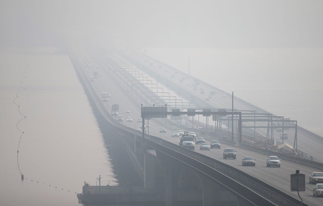 The Interstate 90 bridge over Lake Washington in Seattle disappears through heavy smoke from wildfires on Friday, September 11, 2020.