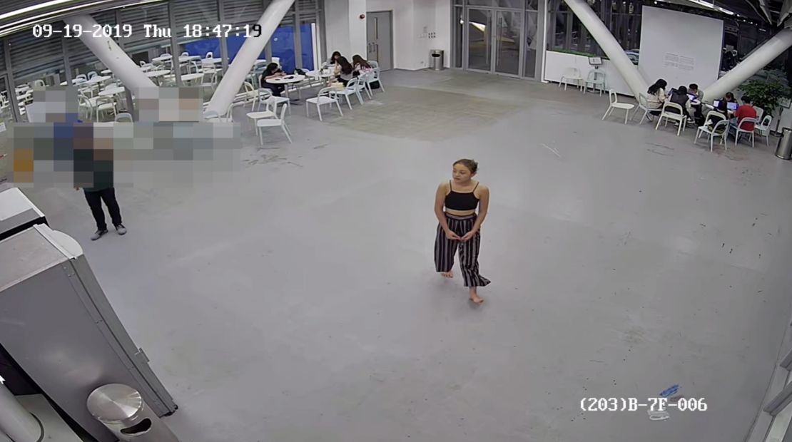 Chan walks through the canteen at the Hong Kong Design Institute. This was one of the last times she was seen alive. 