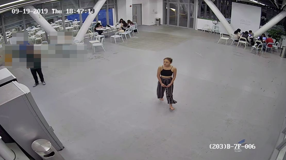 Chan walks through the canteen at the Hong Kong Design Institute. This was one of the last times she was seen alive.