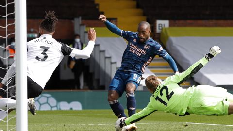 Arsenal's French striker Alexandre Lacazette scores the opening goal of the English Premier League season in his side's 3-0 win over Fulham.