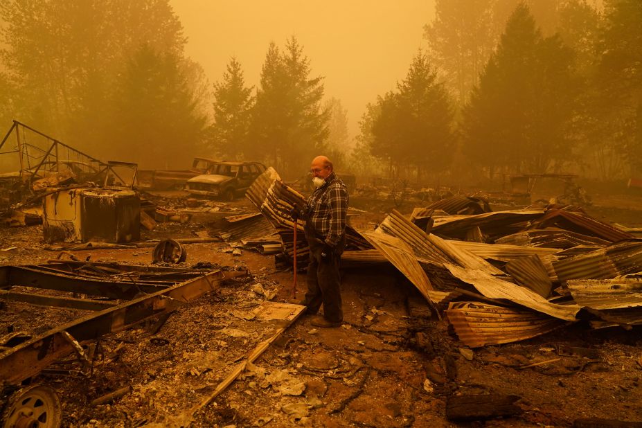 George Coble walks through his destroyed property in Mill City, Oregon, on September 12, 2020.