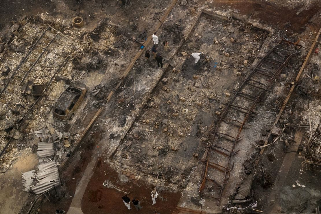 Personnel search for the remains of fire victims in the Bear Lakes Estates neighborhood in Phoenix, Oregon, on Saturday, September 12.