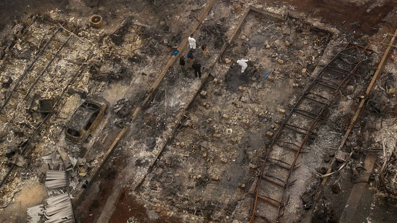 Personnel search for the remains of fire victims in the Bear Lakes Estates neighborhood in Phoenix, Oregon, on Saturday, September 12.