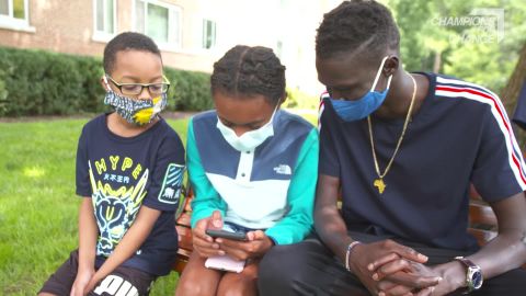 Mayen teaching kids in Washington, D.C., how to play his game "Salaam."