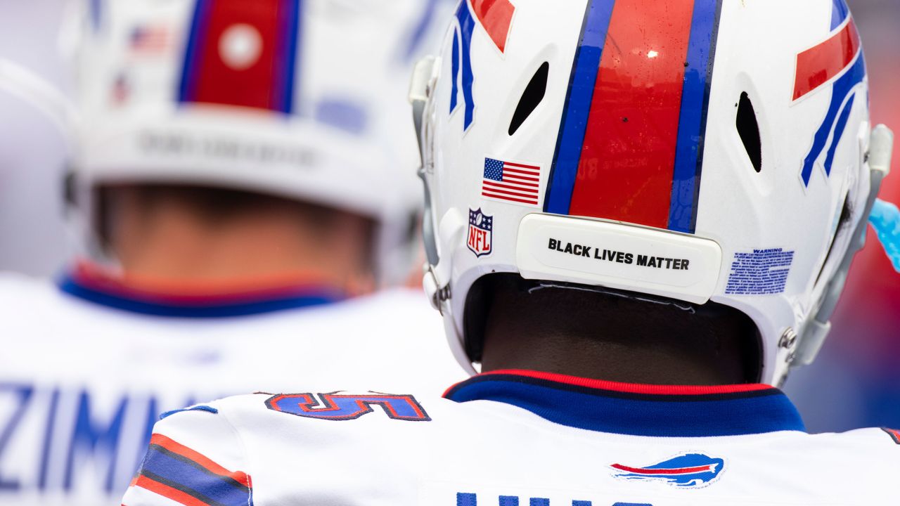 Detail view of a Black Lives Matter sticker on the back of a football helmet worn by Buffalo Bills defensive end Jerry Hughes before the Bills' game against the New York Jets on Sunday, September 13