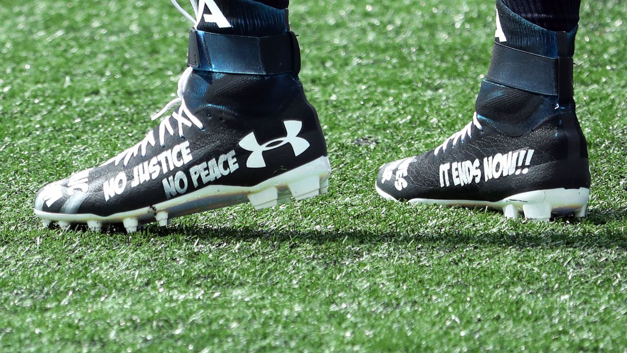 The cleats worn by Cam Newton of the New England Patriots before the game between the Patriots and the Miami Dolphins at Gillette Stadium on Sunday, September 13.