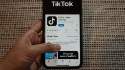 The download page for ByteDance Ltd.'s TikTok app on the Apple Inc. App Store is displayed on a smartphone in an arranged photograph in Beijing, China, on Tuesday, Sept. 1, 2020. U.S. President Donald Trump said he's told people involved in the sale of the U.S. assets of ByteDance's TikTok that the deal must be struck by Sept. 15 and the federal government must be "well compensated," or the service will be shut down. Photographer: Yan Cong/Bloomberg via Getty Images