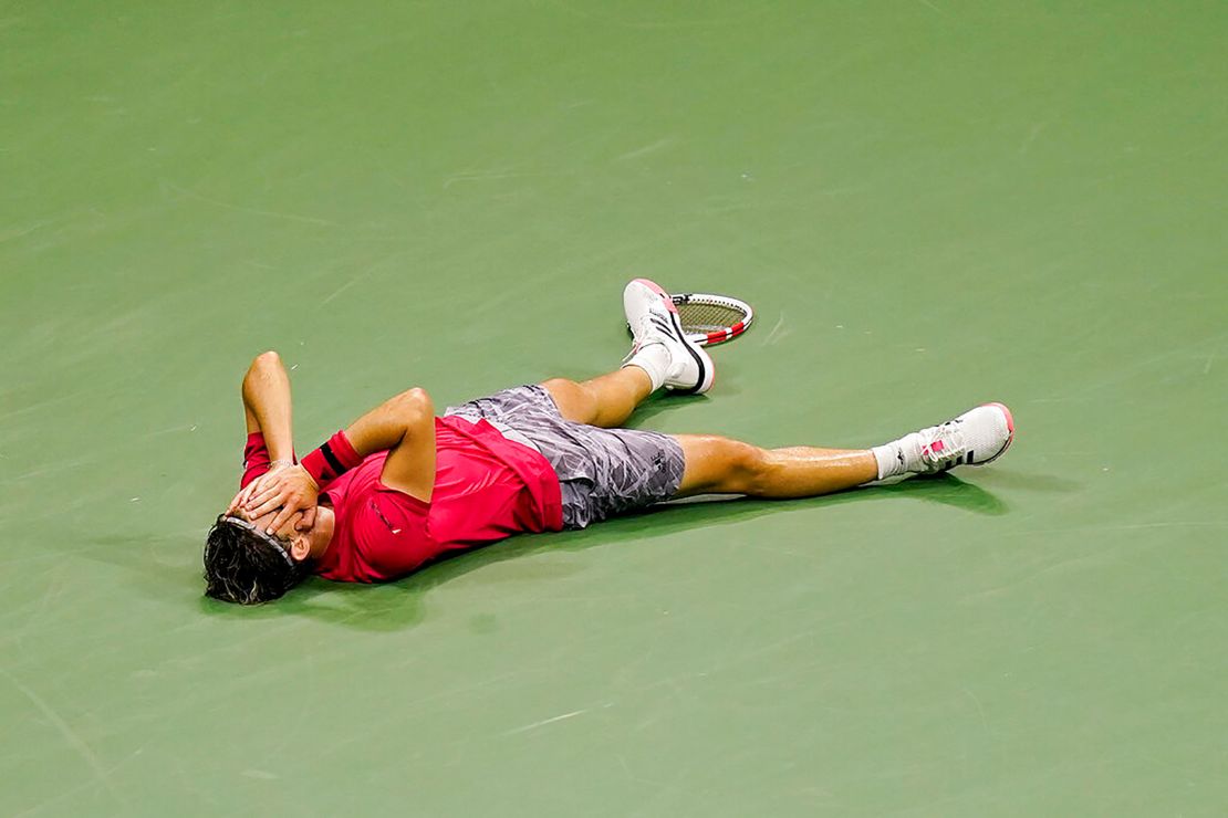 Austrian Dominic Thiem lays on the court after winning the men's singe US Open tennis championships on Sunday, September 13.