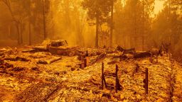 A burned residence smolders during the Bear fire, part of the North Lightning Complex fires, in unincorporated Butte County, California on September 09, 2020. (Josh Edelson/AFP/Getty Images)