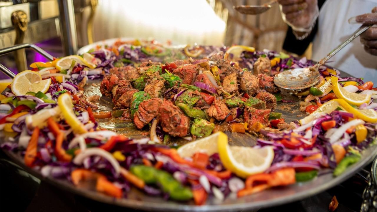 Rassoi's sizzling chicken platter is both popular and quite colorful.