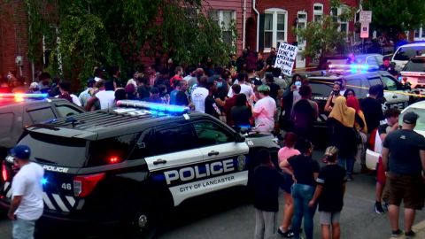 Protesters in Lancaster, Pennsylvania, gather at the scene where a police officer shot and killed a 27-year-old man wielding a knife.