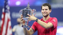 NEW YORK, NEW YORK - SEPTEMBER 13: Dominic Thiem of Austria celebrates with championship trophy after winning in a tie-breaker during his Men's Singles final match against Alexander Zverev of Germany on Day Fourteen of the 2020 US Open at the USTA Billie Jean King National Tennis Center on September 13, 2020 in the Queens borough of New York City. (Photo by Matthew Stockman/Getty Images)