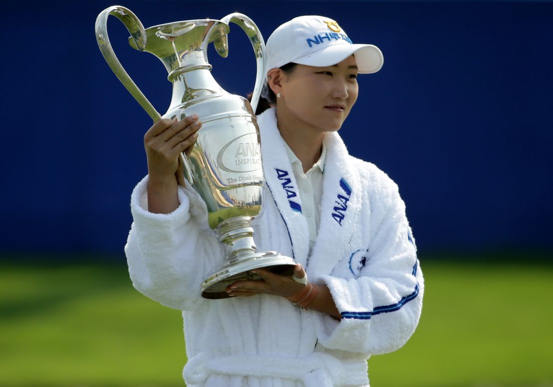 Mirim Lee of South Korea poses with the ANA Inspiration trophy.