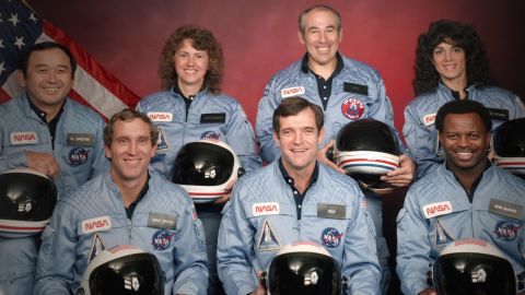 The Challenger 7 flight crew (L to R): Ellison S. Onizuka; Mike Smith; Christa McAuliffe; Dick Scobee; Gregory Jarvis; Judith Resnik; and Ronald McNair (Public Domain/NASA)