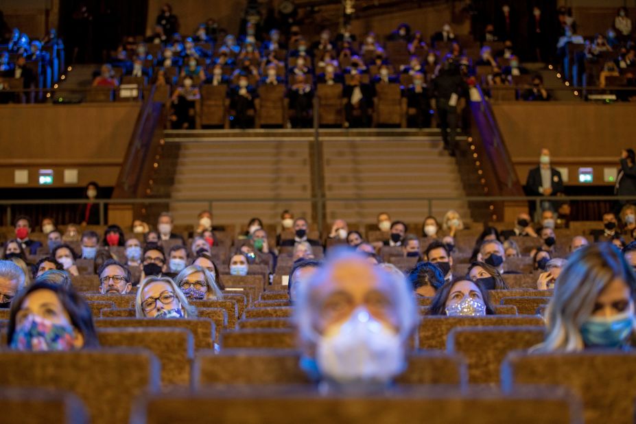 People wear face masks and sit spread apart at the opening ceremony of the Venice Film Festival in Italy on September 2.