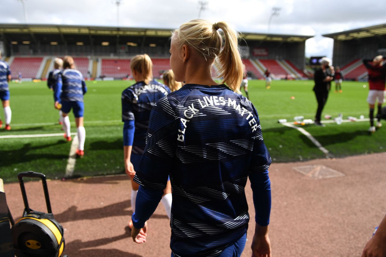 Chelsea's Pernille Harder walks out for a warm-up before a soccer match in Leigh, England, on September 6.