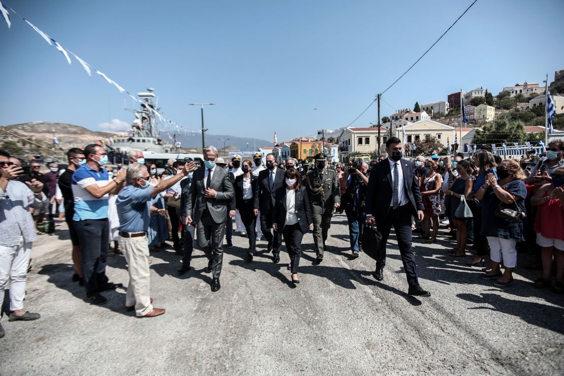 Greece's President Katerina Sakellaropoulou, center, is cheered by residents during her visit to Kastellorizo on Sunday.