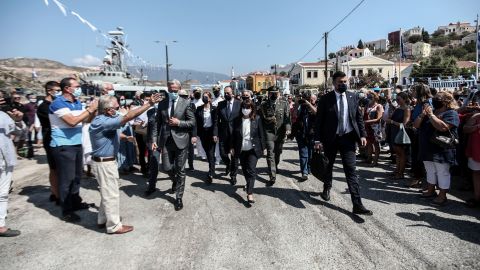 Greece's President Katerina Sakellaropoulou, center, is cheered by residents during her visit to Kastellorizo on Sunday.