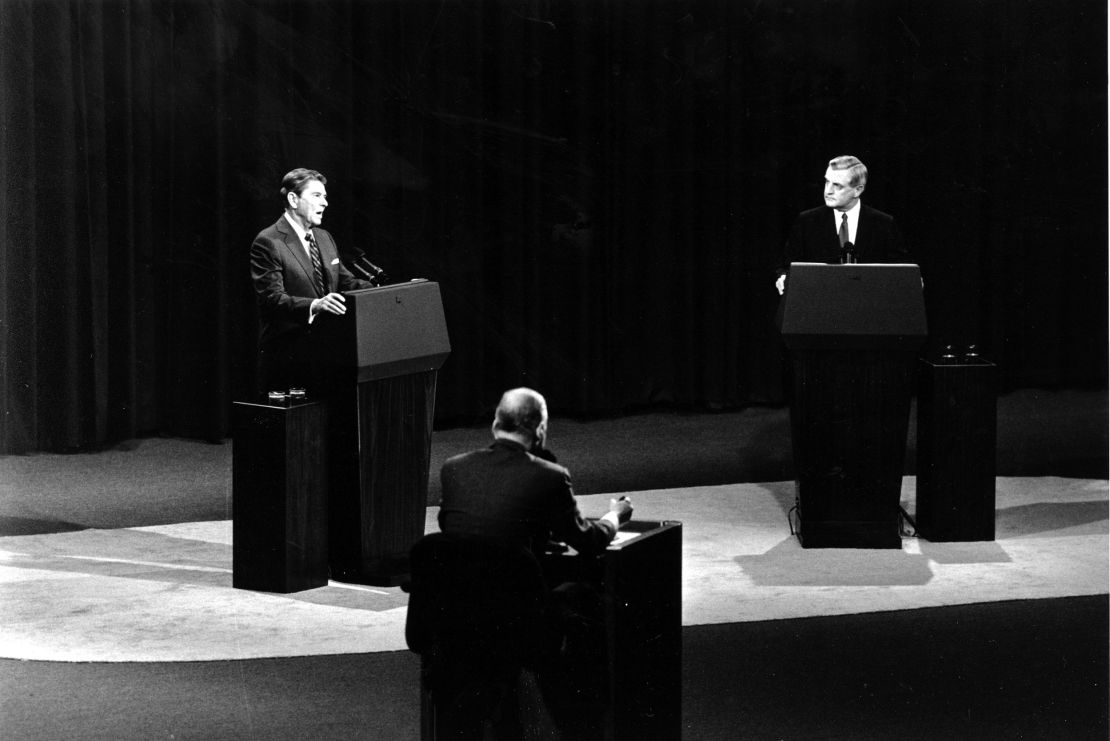 President Ronald Reagan answers a question as Democratic candidate Walter Mondale listens during the second round of the presidential debates in Kansas City, Missouri, in 1984.